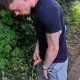 uncut guy pissing outdoor and flaunting his dick