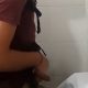 Guy with uncut dick peeing and shaking at the urinal