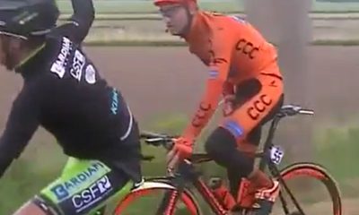 Cyclist caught peeing during race