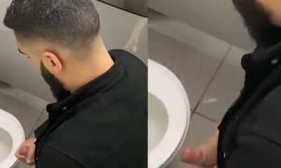 Bearded horny dude caught masturbating in public toilet