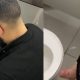 Bearded horny dude caught masturbating in public toilet