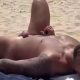 Hung latin nudist guy sunbathing naked at the beach